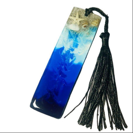 Sea theme, bookmark with shore line with different shells