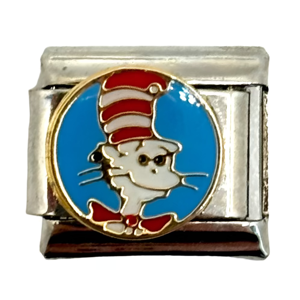 Small decorative charm with a character design on a white background