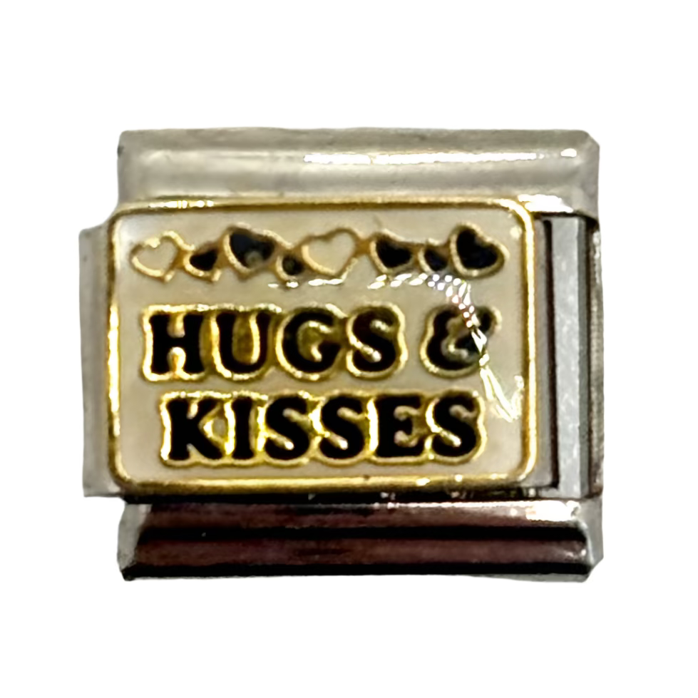 Gold charm with 'Hugs & Kisses' text on a white background